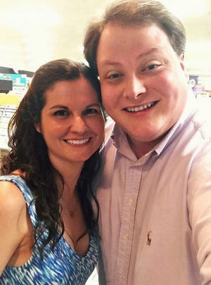 Former child actress Lisa Jakub poses for a selfie with lifestyles reporter Wade Allen at Park Road shopping center in Charlotte on July 24.