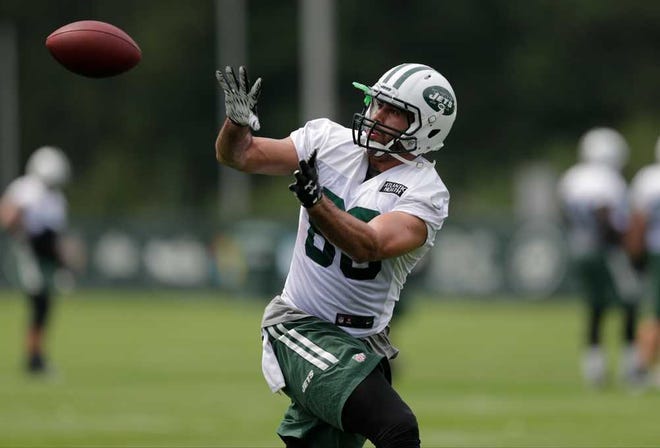 FILE - In this July 30, 2015, file photo, New York Jets tight end Jace Amaro (88) makes a catch at training camp in Florham Park, N.J. Randle started training camp as the front-runner to replace NFL rushing champion DeMarco Murray in Dallas. With injuries affecting other candidates, the third-year back might be the last man standing. (AP Photo/Frank Franklin II, File)