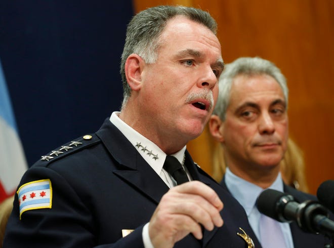 Chicago Police Superintendent Garry McCarthy, left, speaks at a news conference in Chicago Oct. 15, 2013. The Chicago Police Department will allow independent evaluations of its stop-and-frisk procedures that critics have said targeted blacks under an agreement announced Friday, Aug. 7, 2015 with the American Civil Liberties Union, an agreement that comes as police departments across the United States are under intense scrutiny about the way they treat minorities. THE ASSOCIATED PRESS