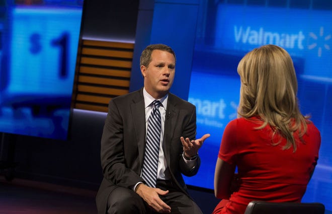 Doug McMillon, president and chief executive officer of Wal-Mart Stores Inc., speaks during a Bloomberg Television interview June 23 in New York. Photo/Bloomberg News