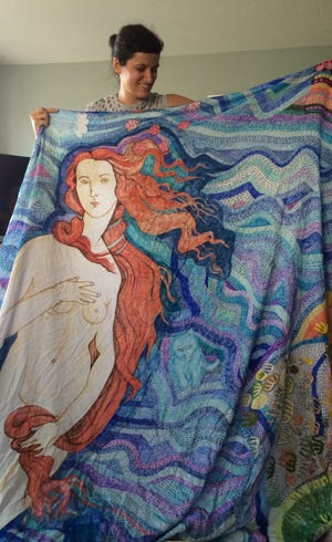 Zehra Khan and “Provincetown Venus,” ink on bedsheet, double sided. Photo Susan Rand Brown