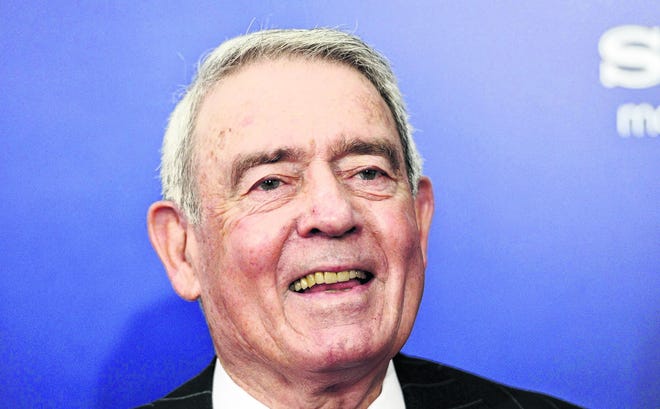 FILE - In this Oct. 5, 2011 file photo, former CBS News anchor Dan Rather attends the premiere of "The Ides of March" in New York. The veteran broadcaster has quietly shut down the "Dan Rather Reports" newsmagazine he'd been making since leaving CBS News a decade ago and opened an independent production company, with seed money from AXS-TV founder Mark Cuban in exchange for a series of interviews with entertainers. His "News & Guts" firm is even working on a scripted fiction series. (AP Photo/Evan Agostini, File)