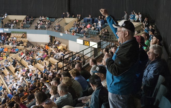 John Dolan of Marlboro cheers for a Worcester goal during the final regular season game of the Worcester Sharks April 19 at the DCU Center in Worcester. T&G File Photo/Rick Cinclair