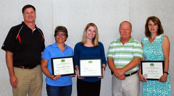 Healthy Gaston Silver Level recipients, from left, with five people representing Hagan Kennington Oil, the Shelter of Gaston County and the Cookson Co. Eastside Church of the Nazarene (not pictured)