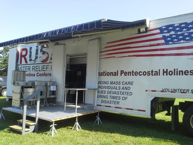 A Disaster Relief USA mobile feeding kitchen sits open and on display at the First Pentecostal Holiness Church on Phillips Road. The North Carolina Conference of the International Pentecostal Holiness Church purchased and outfitted the kitchen with donations to assist in areas and times of most need.