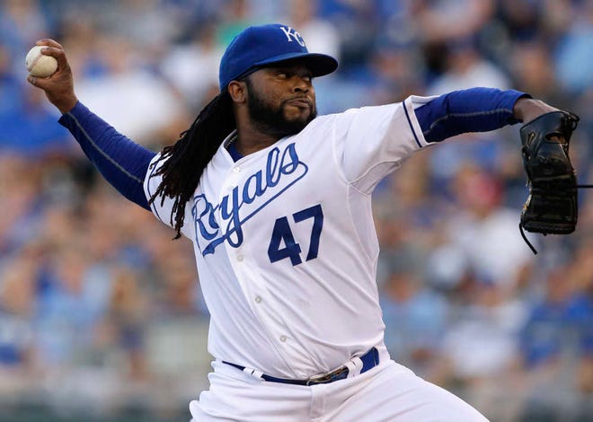 Kansas City Royals starting pitcher Johnny Cueto delivers to a Detroit Tigers batter during the first inning of a baseball game at Kauffman Stadium in Kansas City, Mo., Monday, Aug. 10, 2015. (AP Photo/Orlin Wagner)