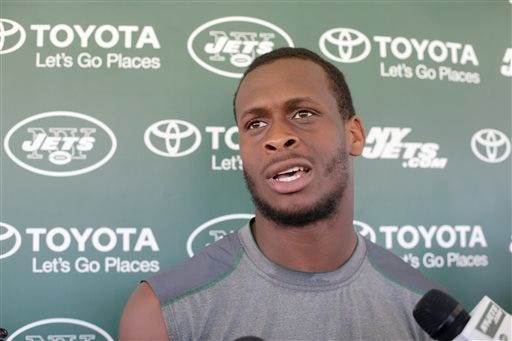 FILE - In this Aug. 4, 2015, file photo, New York Jets quarterback Geno Smith responds to questions during a news conference after practice at NFL football training camp in Florham Park, N.J. Jets quarterback Geno Smith will be sidelined at least 6-10 weeks after being punched in the jaw by teammate Ikemefuna Enemkpali. Coach Todd Bowles made the announcement before training camp practice Tuesday, Aug. 11, 2015. (AP Photo/Frank Franklin II, File)