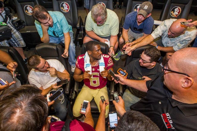 FILE - In this Aug. 9, 2015, file photo, Florida State quarterback Everett Golson, center, talks during NCAA college football media day in Tallahassee, Fla. All the impressive things on the Atlantic Coast Conference's recent resume belong to one school _ Florida State.