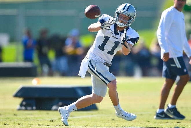 Dallas Cowboys wide receiver Cole Beasley makes a catch during a drill at Dallas Cowboys' NFL training camp, Tuesday, Aug. 4, 2015, in Oxnard, Calif. (AP Photo/Gus Ruelas)