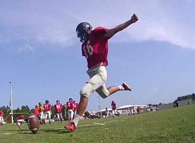 PETER.WILLOTT@STAUGUSTINE.COM Creekside junior Garrison Turnage is St. Johns County's most experienced specialist entering the 2015 season. As a sophomore he averaged 41.2 yards per punt and converted on three of five field goal attempts. Turnage is seen lining up a field goal during an August 8, 2015 practice.