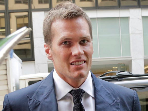 New Patriots' Tom Brady, seen June 23, will go to court Wednesday over his four-game suspension that was handed down by NFL Commissioner Roger Goodell. (Mark Lennihan | Associated Press)