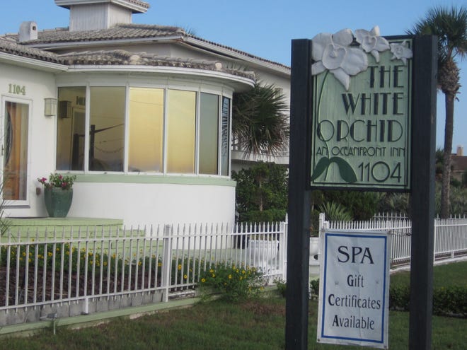 Heather and Derek Hodovance bought the White Orchid Inn & Spa in Flagler Beach in late May for $1.9 million. News-Journal/CLAYTON PARK