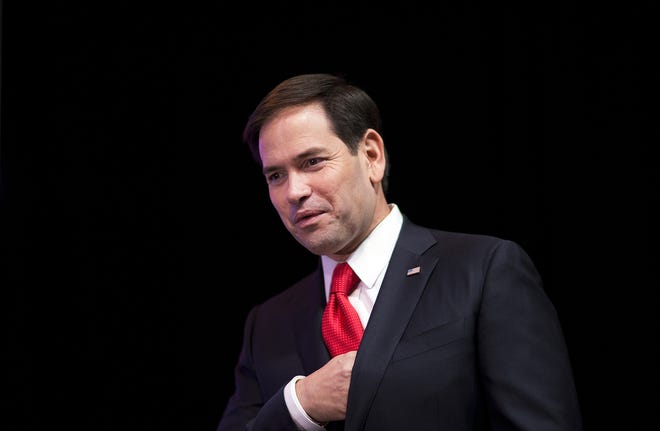 Republican presidential candidate Sen. Marco Rubio, R-Fla., steps on the stage to speak at the RedState Gathering Friday, Aug. 7, 2015, in Atlanta. (AP Photo/David Goldman)