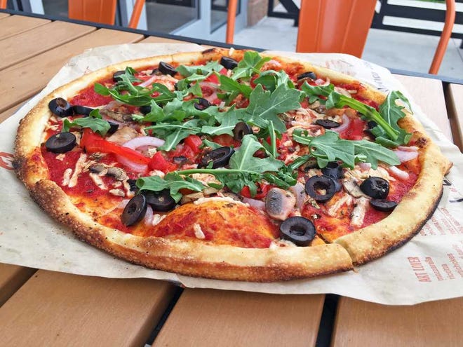 Blaze offers a customizable vegan pie, complete with dairy-free cheese and toppings.