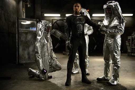This photo provided by Twentieth Century Fox shows, Michael B. Jordan as Johnny Storm, in a scene from the film, "Fantastic Four," releasing in U.S. theaters on Aug. 7, 2015. (Ben Rothstein/Twentieth Century Fox via AP)