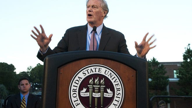 TALLAHASSEE, FL- NOVEMBER 20: Florida State University President John Thrasher speaks during the Gathering of Unity candlelight vigil on campus after the shooting of three FSU students earlier in the day on November 20, 2014 in Tallahassee, Florida. About 3,000 students attended the vigil according to FSU Police Chief David Perry. (Photo by Mark Wallheiser/Getty Images)