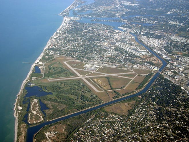 An aerial view of the Venice Municipal Airport near the Gulf of Mexico.