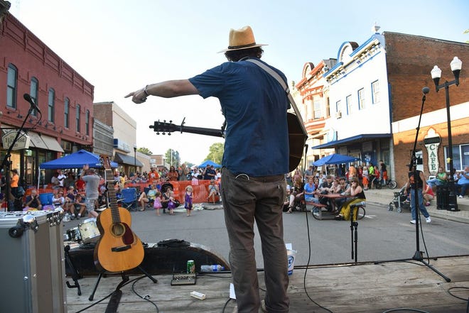 Cody Diekhoff performs Sunday during Rock the Block for Delavan, a benefit concert for tornado relief.