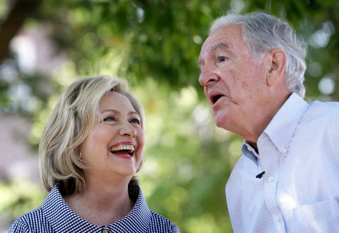 Democratic presidential candidate Hillary Rodham Clinton laughs with former Sen. Tom Harkin during a visit to the Iowa State Fair, Saturday, Aug. 15, 2015, in Des Moines, Iowa. (AP Photo/Charlie Neibergall)