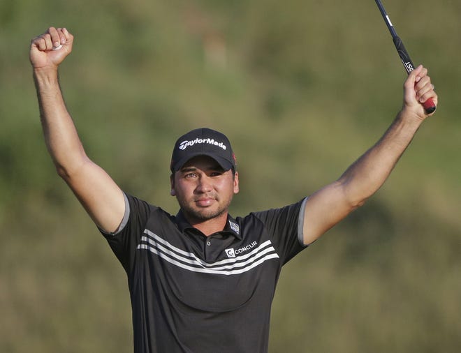 Australia's Jason Day raises his arms in triumph after winning the PGA Championship on Sunday at Whistling Straits in Wisconsin. AP photo