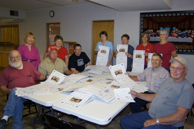 Members of the Natoma Lions Club assemble 217 community calendars for distribution. The annual project continues to provide free listings of birthdays, anniversaries and special community events. Members assigned for distribution are David George (from left), Laah Tucker, Ron Murphy, Mary Murphy, Pastor Michael Schmidt, Dawn Phlieger, Shawna Dunlap, Corinne Masters, Beverly Hachmeister, Terry Tucker and Gail Griffin.