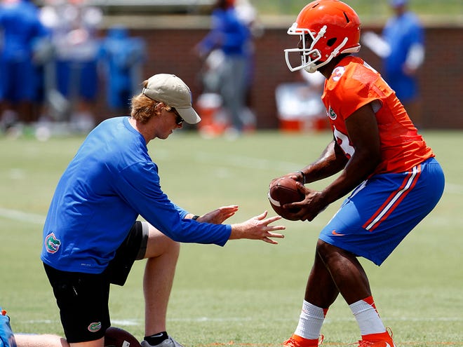 Quarterback Treon Harris works out during the first day of football practice for the Florida Gators on Thursday, August 6, 2015 in Gainesville.