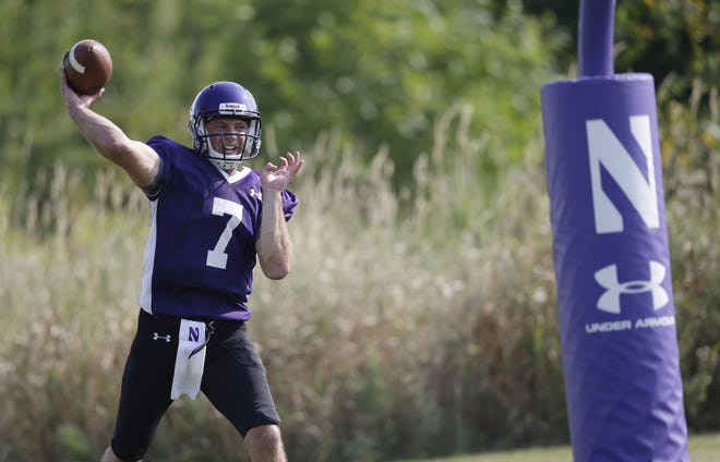 Northwestern's Matt Alvita throws a pass during practice on Monday. THE ASSOCIATED PRESS