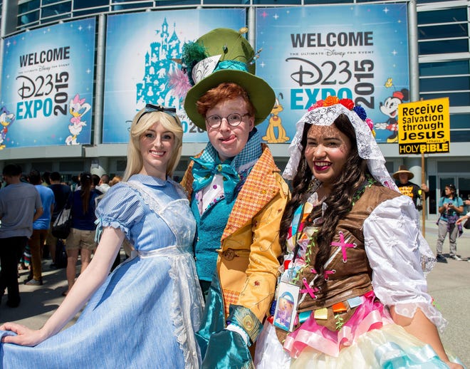 Chelsea Rebecca, David McCarthy and Andie Vazquez, from left attend the D23 EXPO 2015 Aug. 15 at the Anaheim Convention Center in Anaheim, Calif. The Orange County register/The Associated Press