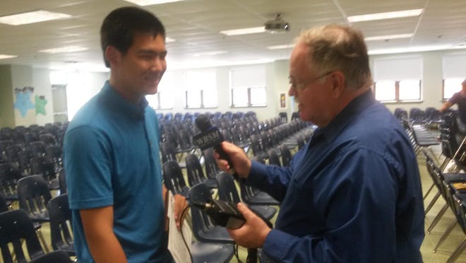 James Lu is interviewed by Jim Phillips of WBSM upon graduating from Sea Lab Aug. 14. SUBMITTED