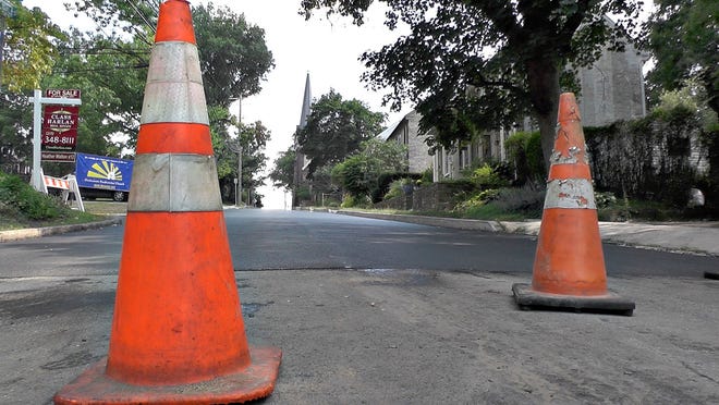 Cones block the entrance to Church Street in Doylestown Wednesday, August 19, 2015. They are one of the few municipal work crews that can both reconstruct and repave roads and are saving the borough about a quarter of a million dollars a year.