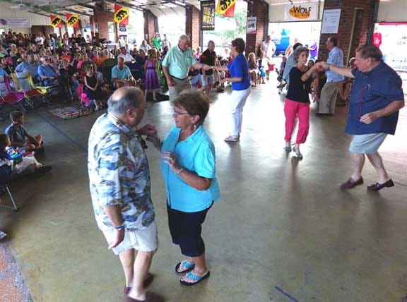 The clock turned back for dancing Friday night at the YPG Jam at the New Bern Farmers Market for dancing couples, swaying to the tunes of The Embers.