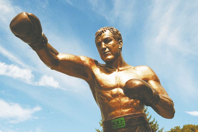A 22-foot-tall statue of the undefeated boxing champion towers over Brockton High School's Marciano Stadium.