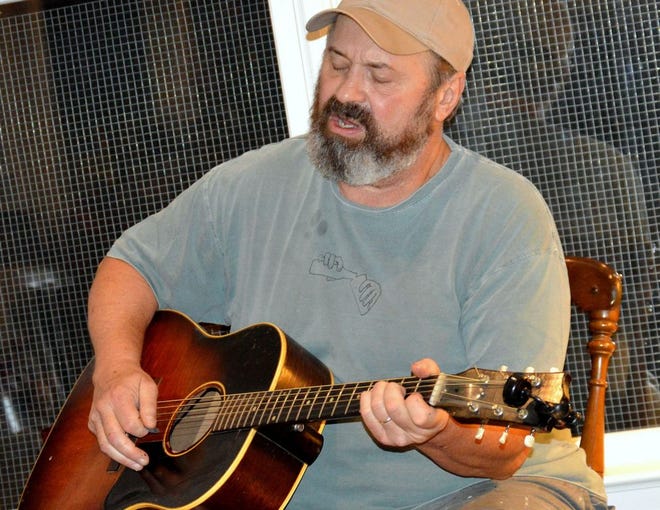 David Childers practices for a performance that will take place Saturday night during the Mill Mother's Lament CD Jam Session. Photos by Tammy Cantrell/Encaptured Photography