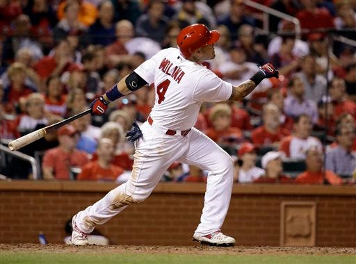 The St. Louis Cardinals' Yadier Molina watches his solo home run during the eighth inning of Wednesday's game against the San Francisco Giants. THE ASSOCIATED PRESS