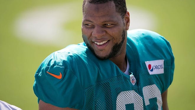 Miami Dolphins defensive tackle Ndamukong Suh (93) at Dolphins training camp in Davie, Florida on August 11, 2015. (Allen Eyestone / The Palm Beach Post)