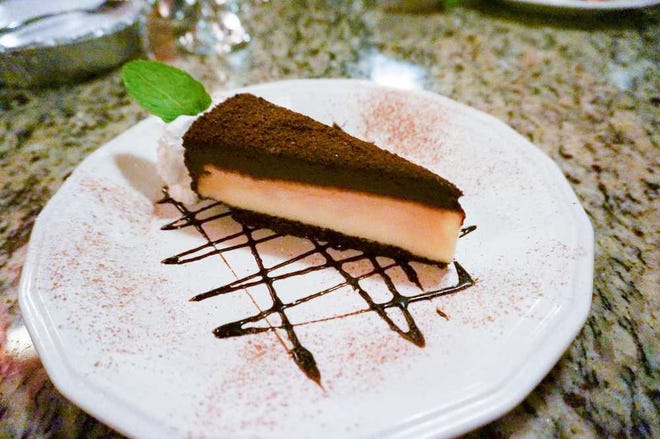 Gusto's chocolate ganache cheesecake ($7) is plenty for a couple to share.