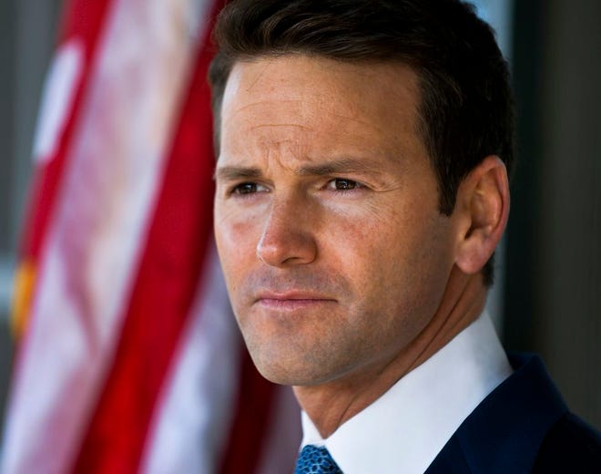 Rep. Aaron Schock makes a statement to reporters during a news conference at his office in Peoria on March 6, 2015.