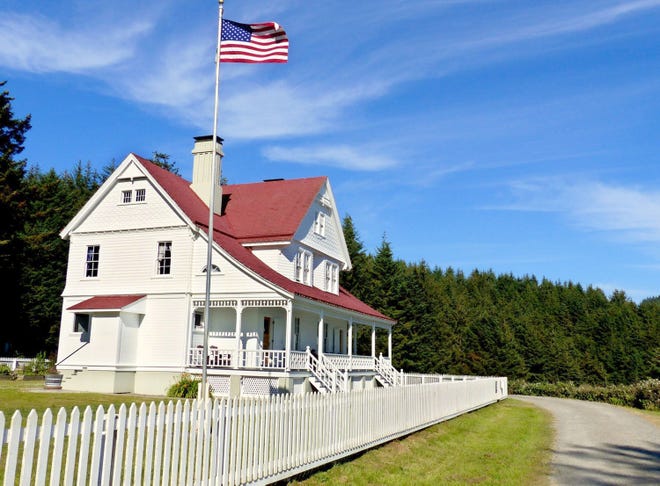 The red-roofed lightkeepers' home at Heceta Head now lodges guests who get a 7-course breakfast.