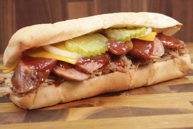 Choose your meats, such as Pulled Pork and Polish Sausage, for your freshly made barbecue sandwich.