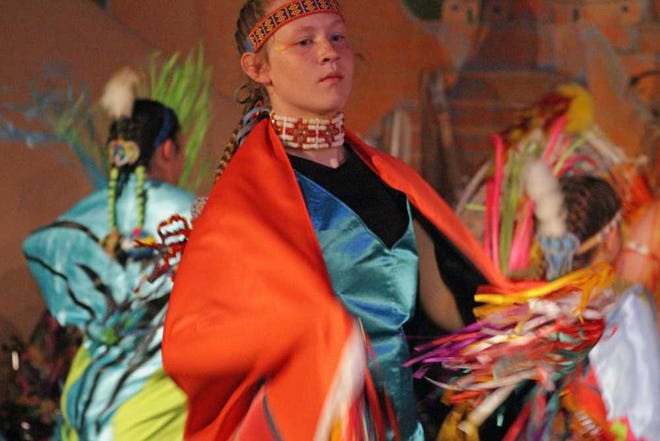Neil Starkey / For the Amarillo Globe News; Cindy McColl is one of the Lead Kwoneshi dancer and performs during the Song of the Eagle performance at the Kwahadi Museum. August 1, 2015