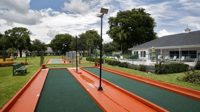Bocce ball courts are one of the many activities at Limetree in Boynton Beach; others include card games, line dancing, mah jongg, pickleball, yoga, water aerobics and group dinners. Contributed by Tim Stepien
