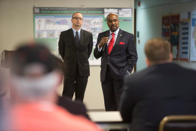 Antonio Riley, regional administrator at U.S. Department of Housing and Urban Development, fields questions alongside Mayor Larry Morrissey during a meeting with Rockford Housing Authority officials Thursday, Aug. 20, 2015, at the Regional Center for Planning and Design in Rockford. SUNNY STRADER/RRSTAR.COM