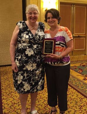 St. James-St. John elementary school nurse Anna Manny receives the 2015 Eleanor Donato Award, which is “presented to the Pennies Coordinator at a school who goes above and beyond to make their Pennies Campaign a great success.” SUBMITTED PHOTO