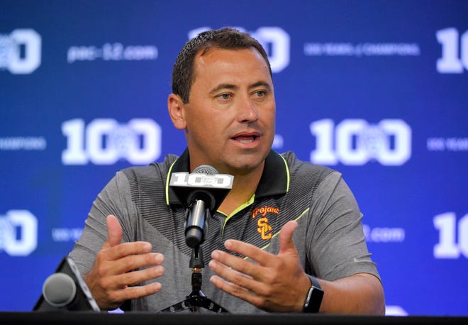 Southern California head coach Steve Sarkisian speaks to reporters during NCAA college Pac-12 Football Media Days, Friday, July 31, 2015, in Burbank, Calif.