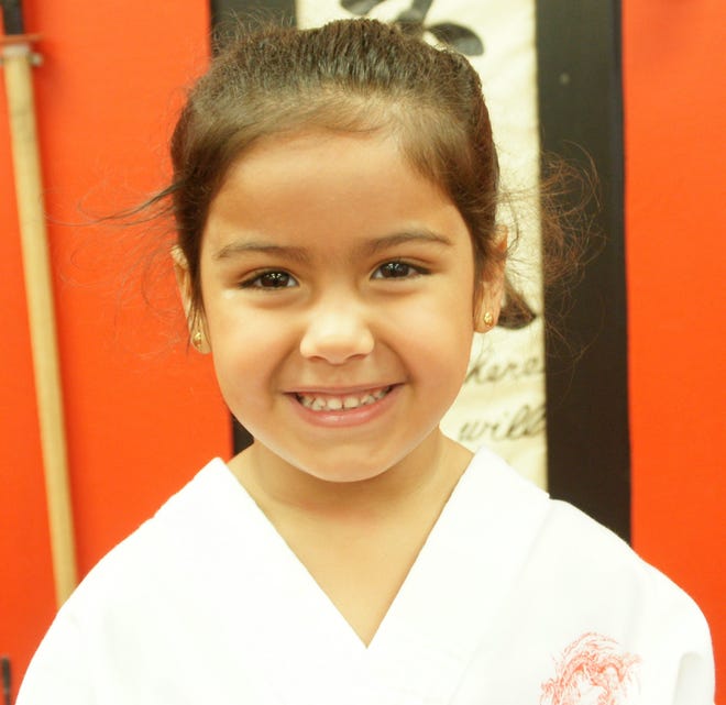 Medford resident Khloe Aviles recently passed her first section test, July 26 at Body Mind Systems Martial Arts School.

Courtesy photo