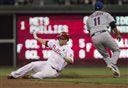 The Phillies' Cody Asche is safe at second on a double before Mets shortstop Ruben Tejada can make the tag in the first inning Monday in Philadelphia.