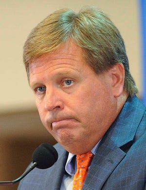 Florida coach Jim McElwain listens to a question during the university's media day on Aug. 5 in Gainesville. McElwain won't tolerate silly penalties, especially those for unsportsmanlike conduct. (AP Photo/Phil Sandlin)