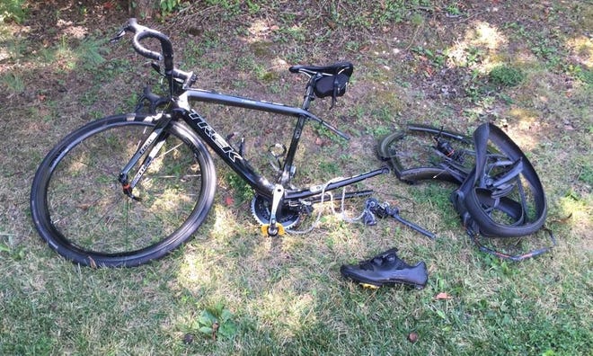 Upper Makefield police posted this photo of the remains of a bike following an accident Monday, Aug. 24, 2015, on River Road. Police say a driver with a suspended license struck and seriously injured the man
