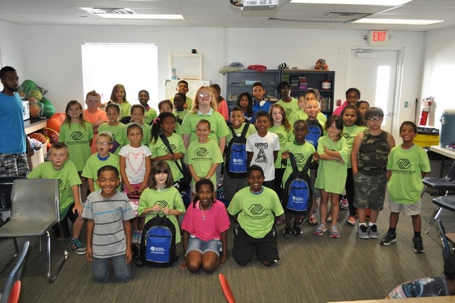On August 6, Florida Hospital Flagler donated backpacks filled with school supplies, such as markers, crayons, folders, paper, and more, to the Boys and Girls Club Summer Reading Program. PHOTO PROVIDED/FLORIDA HOSPITAL FLAGLER