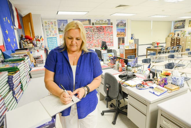 Margit Neiman, who has been teaching French for 25 years, prepares for the new school year at Palisades High School on Tuesday, August 25, 2015, in Kintnersville, Pennsylvania. (Photo by William Thomas Cain)